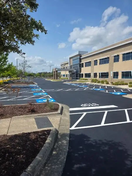 Commercial parking lot line striping and stall layout at a Charlotte NC office park