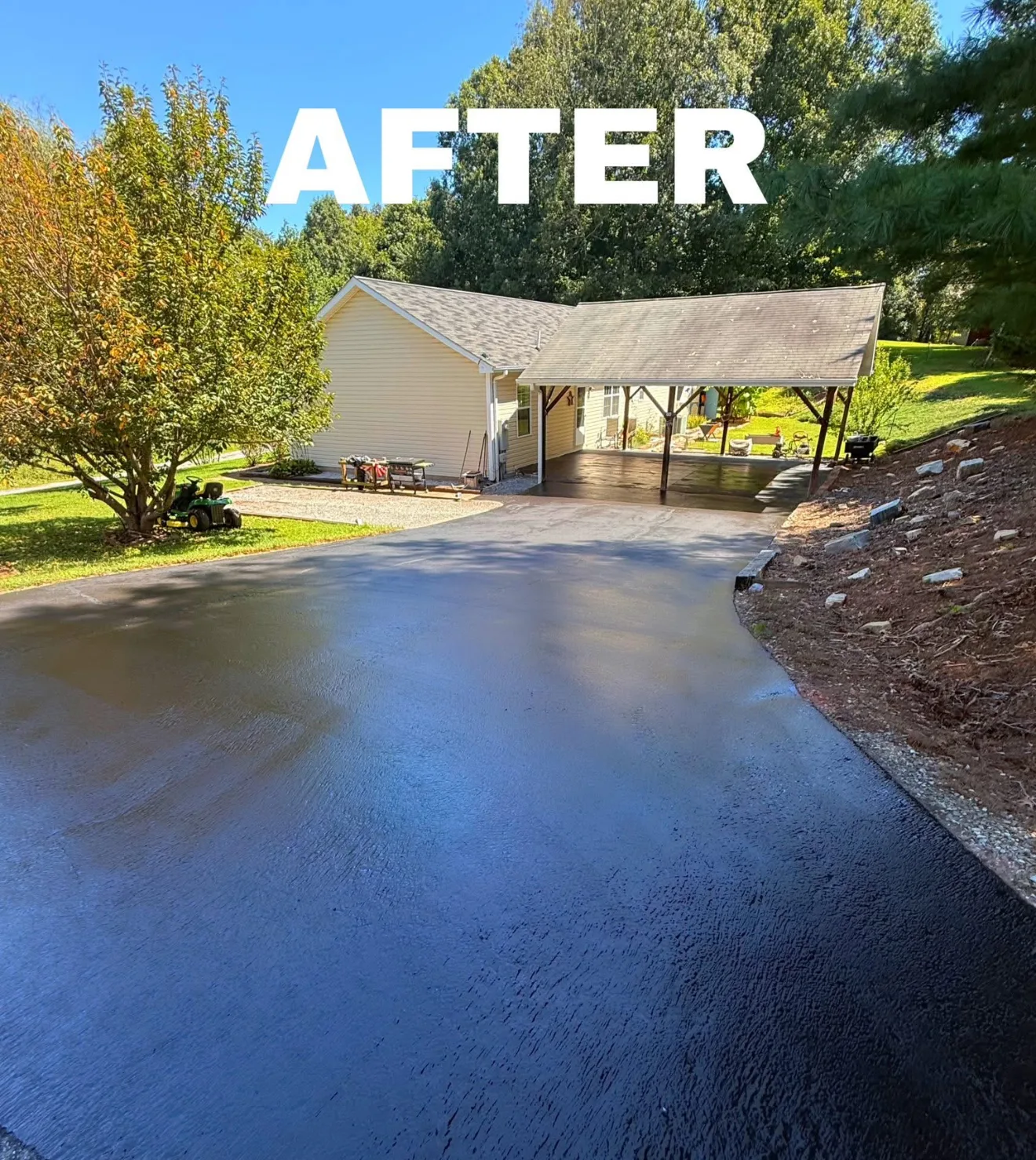 Driveway sealcoating contractors applying premium sealer to a residential asphalt driveway in Charlotte NC