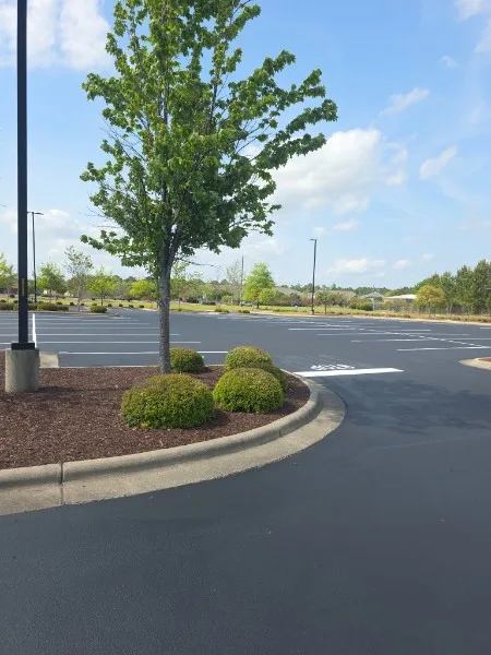 Retail parking lot maintenance including sealcoating and pavement care in Charlotte NC