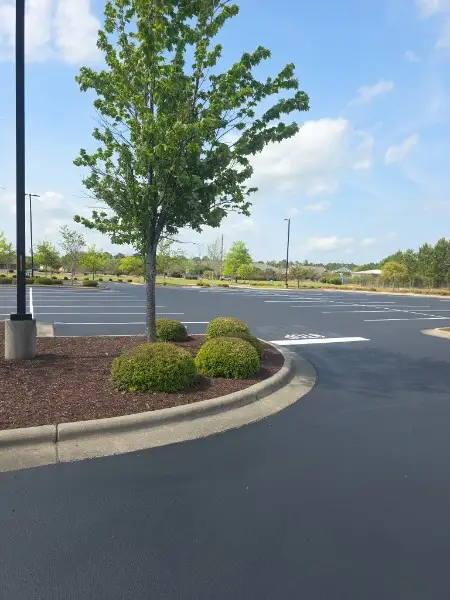 Retail parking lot maintenance including sealcoating and pavement care in Charlotte NC